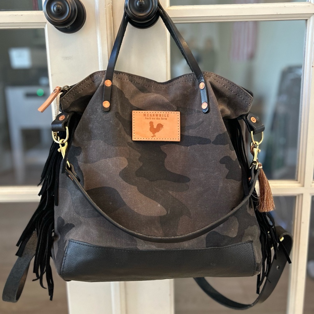 Meanwhile Back On The Farm Waxed Black Camo Fringe Backpack. LIKE NEW